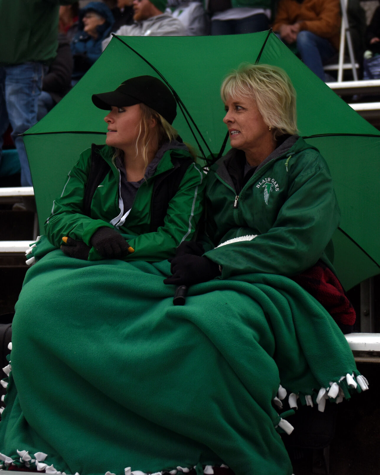 Sarah Bischoff and her mother Kelli Jones watch the Blair Oaks Falcons play